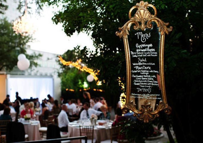 Vintage wedding idea reception menu scrawled on framed mirror