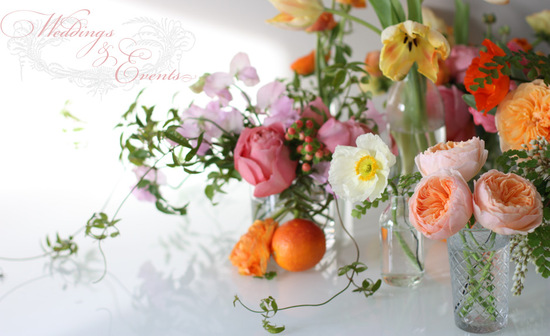 Whimsical wedding centerpieces with peach garden roses