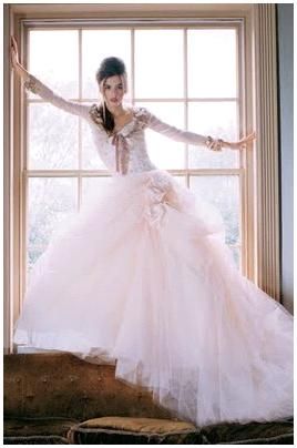 Light pink wedding dress using yards of lightweight pink tulle