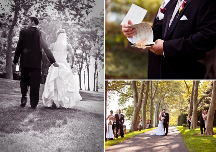 Groom hold back of brides white wedding dress as they walk through the forest together