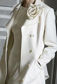 Beautiful Carolina Herrera winter white coatdress with flower applique