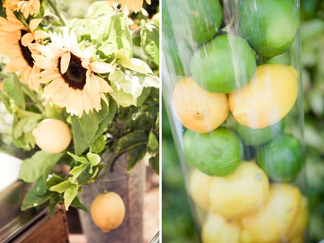 Bright sunflowers in rustic vases, and lemons & limes in clear hurricane vases, for table centerpiec