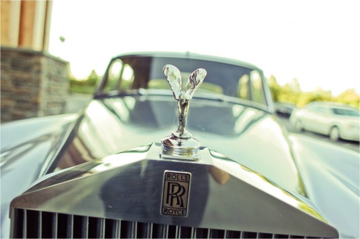 Antique wedding day transportation- a vintage Rolls Royce!