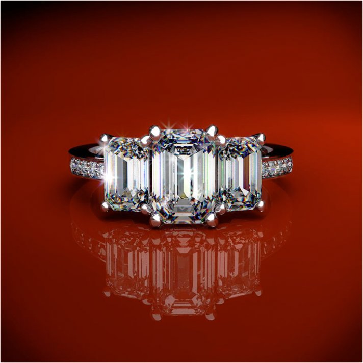 Three stone emerald cut diamond and platinum engagement ring like Kim Kardashian’s