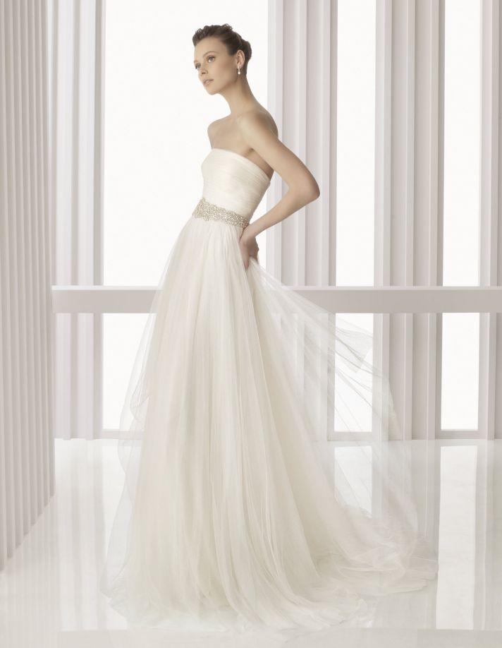 Ethereal strapless ivory Rosa Clara wedding dress with sheer tulle overlay and beaded bridal belt