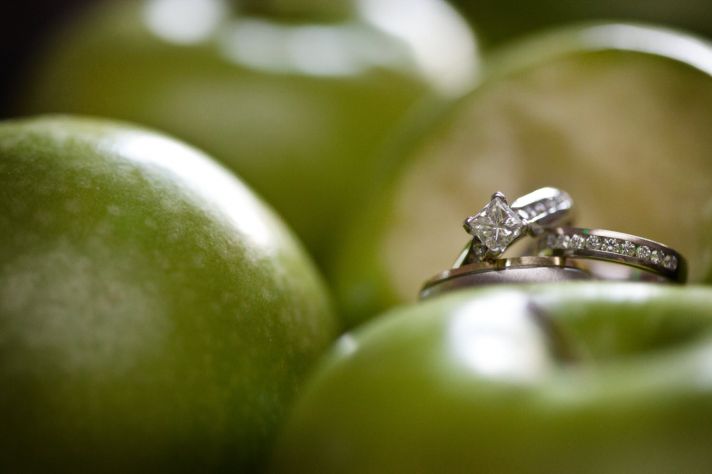 Green apple themed wedding- engagement ring wedding photo