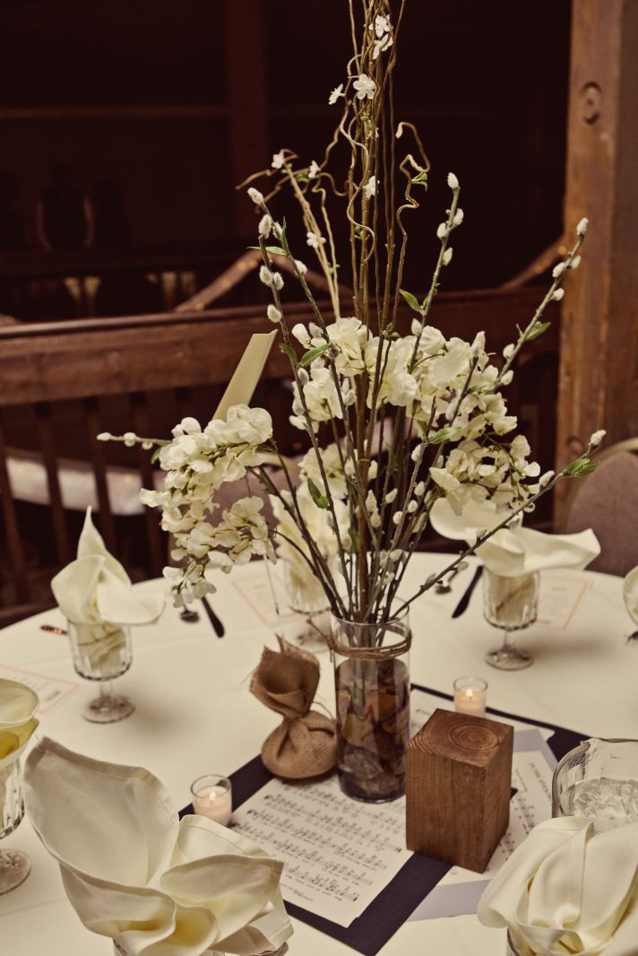 Real Kansas City wedding with ivory wedding flowers and rustic reception decor