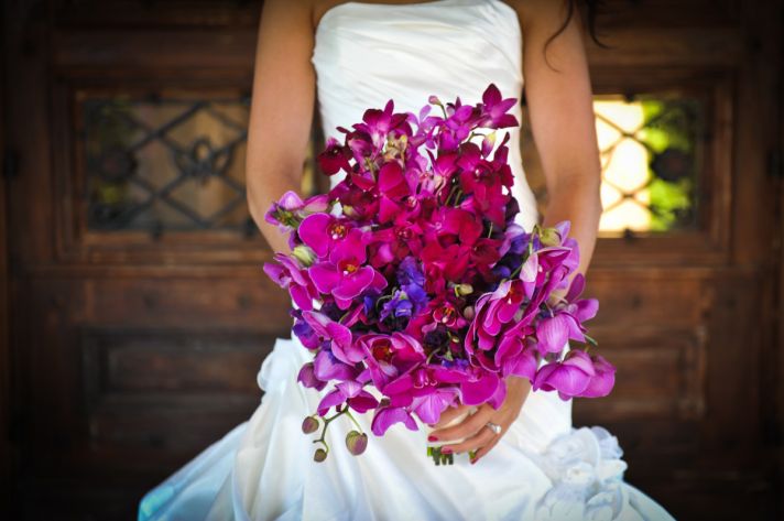 bright wedding flowers bridal bouquet orchids fuschia purple