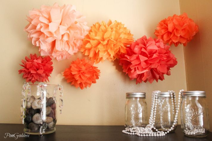 tissue poms for wedding reception decor orange pink coral