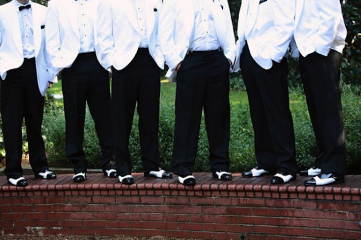 elegant charlotte wedding indoor reception venue purple lighting groomsmen black white