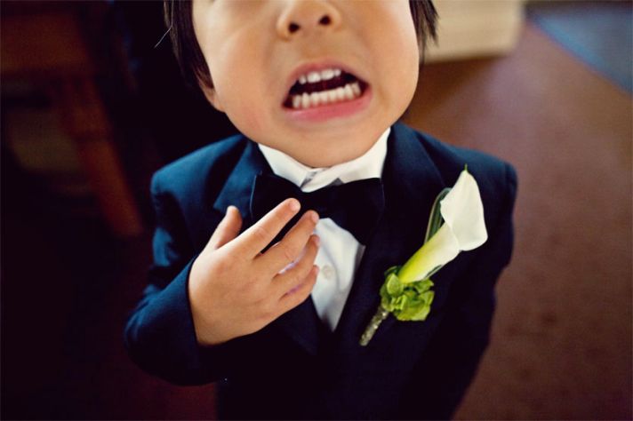 funny wedding photos escape from wedding planning stress Unforgettable Ring Bearers 5