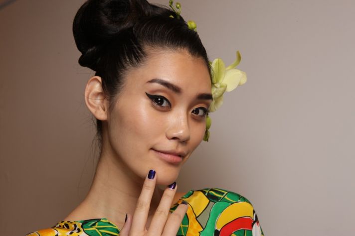 wedding hair makeup trends from fashion week cat eyes 1970s updo at Issa London