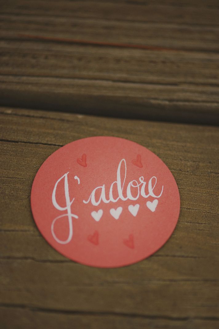 Bride and Groom Hold Dice Spelling Love