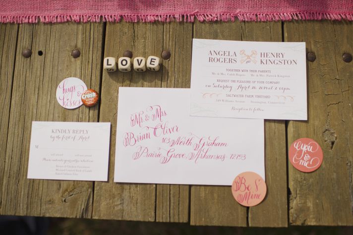 Bride and Groom Hold Dice Spelling Love