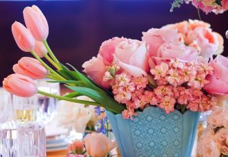 Romantic pink wedding centerpiece with tulips