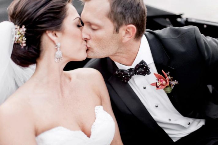 romantic deep red wedding bouquet with crystal embellished ribbon