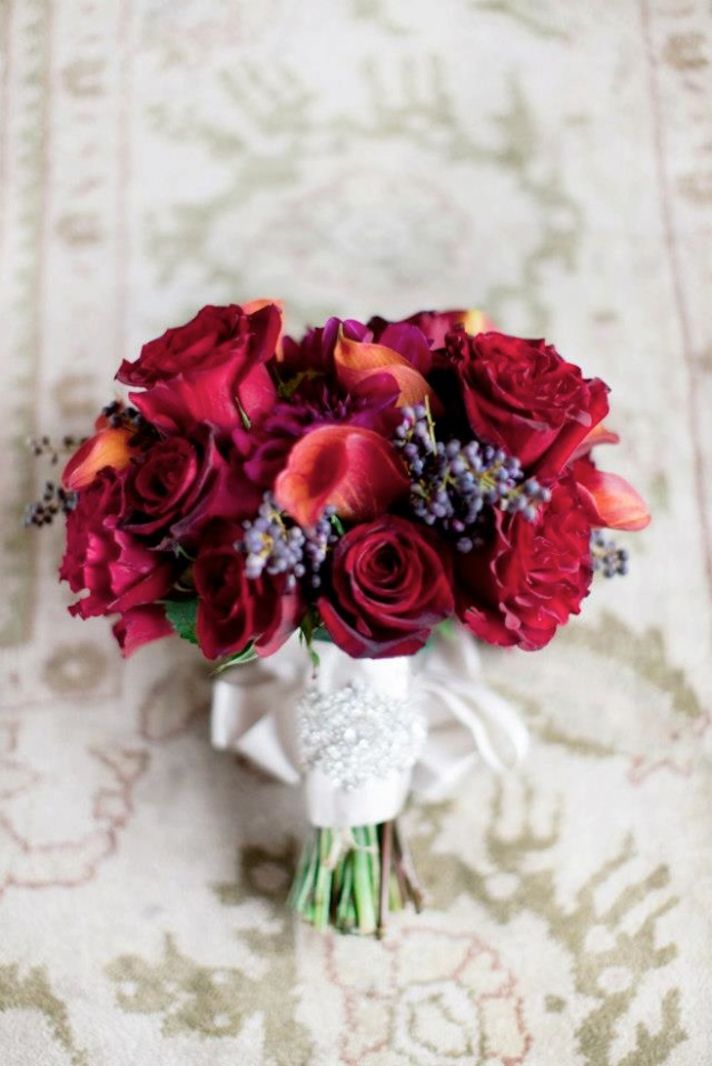 romantic deep red wedding bouquet with crystal embellished ribbon