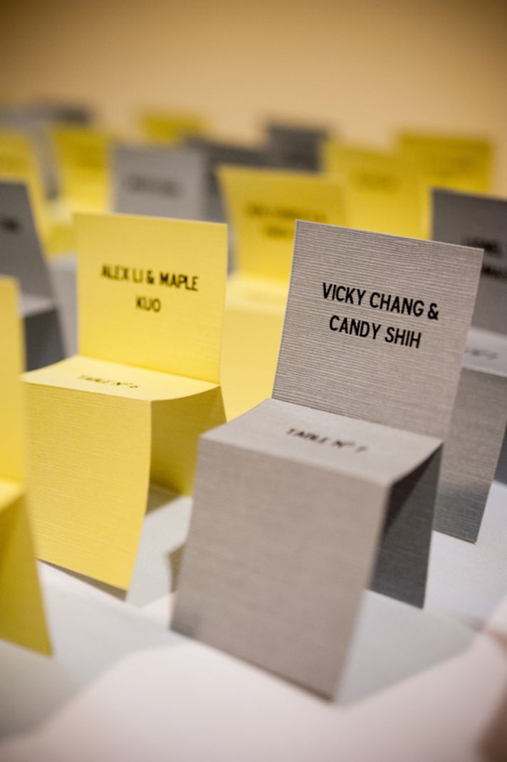 Yellow and Gray Escort Cards in the Shape of Chairs