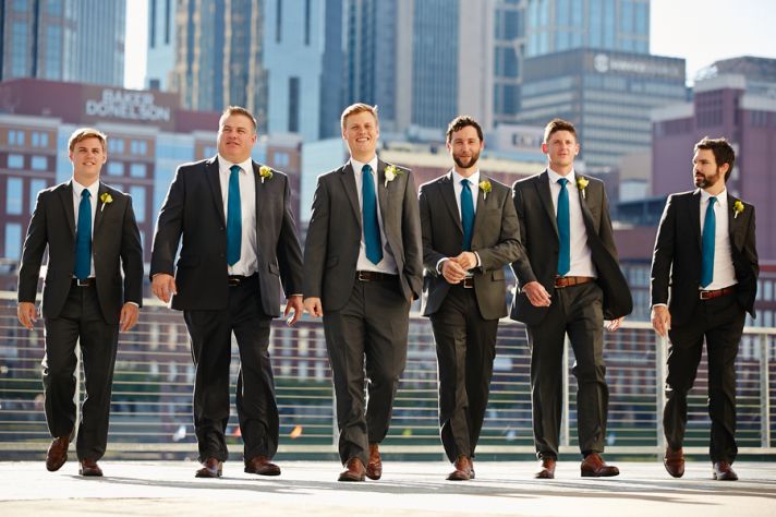 Groomsmen in Blue Ties and Black Suits