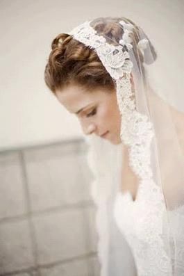 Beautiful white lace mantilla veil