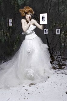 Romantic winter wedding wedding dress with flower applique and feathers