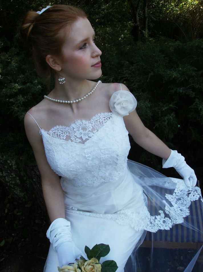 Spaghetti strap lace wedding dress with floral rosette applique