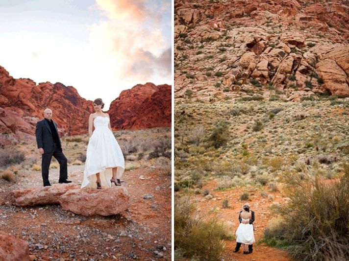 Bride and groom, in full wedding garb, stand atop canyon rocks in Red Rock Canyon