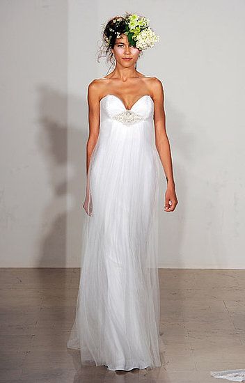 Deep sweetheart neckline wedding dress with jeweled detail at bust