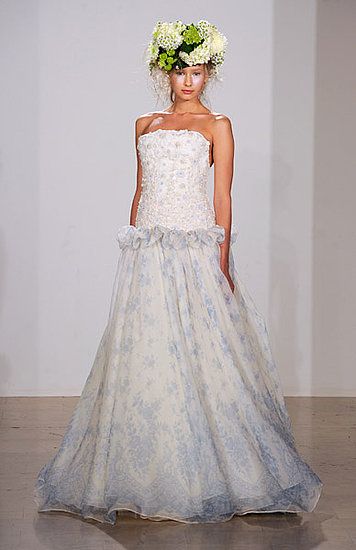 Lovely strapless wedding dress with white appliqued bodice and sky blue and white patterned skirt
