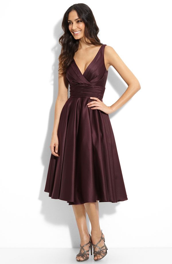 Deep v-neck maroon bridesmaid dress with full tea length skirt