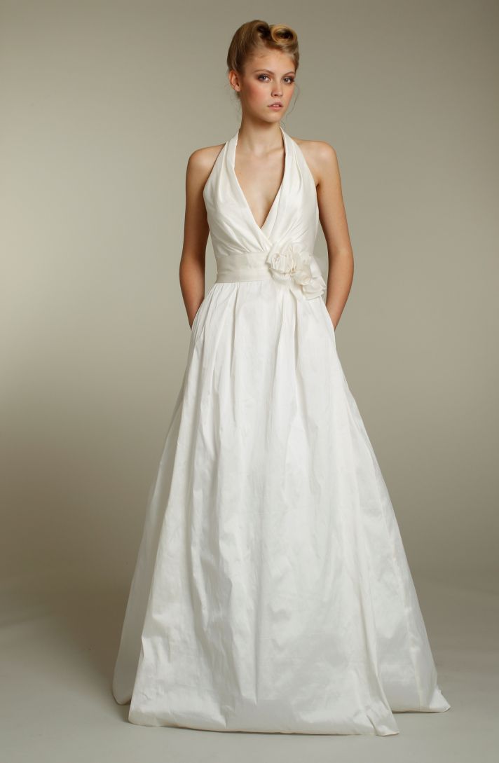 Classic ivory halter a-line wedding dress with pockets and floral-embellished sash
