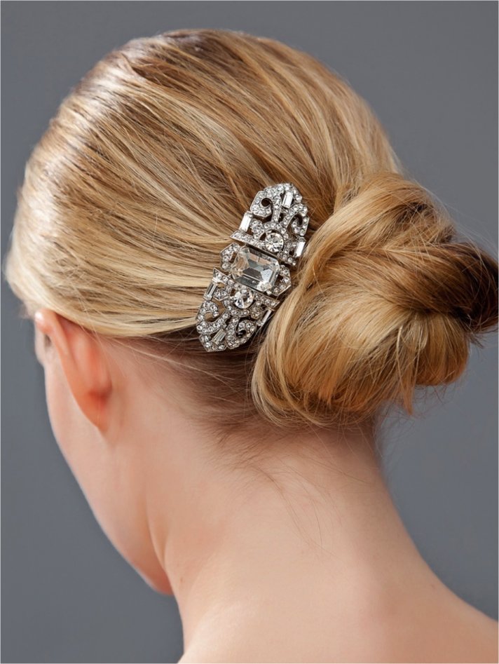 Classic bridal chignon wedding hairstyle with vintage-inspired bridal barrette
