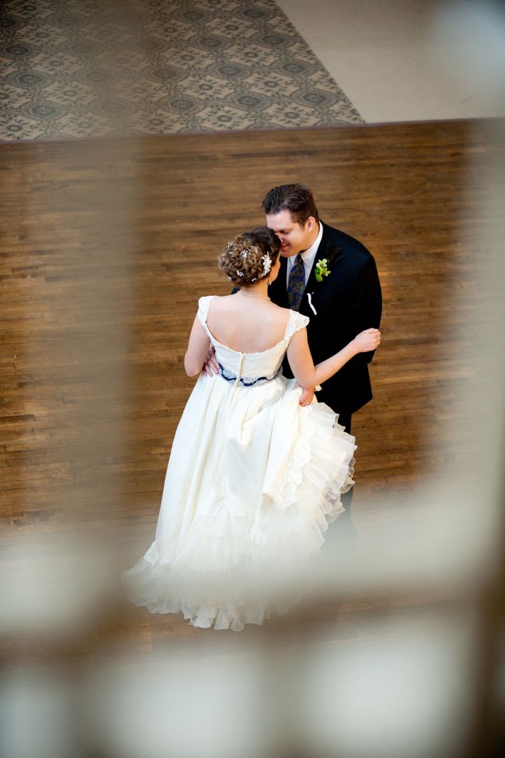 real wedding with a unique theme bride groom at reception 1