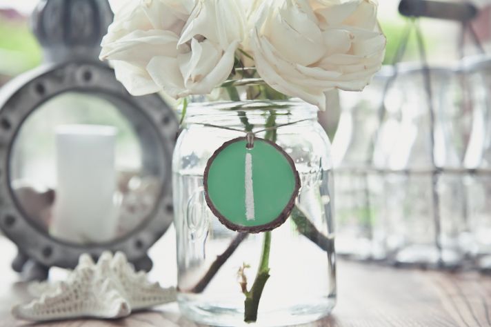 things brides love Mason Jar wedding reception decor centerpieces chalkboard table numbers