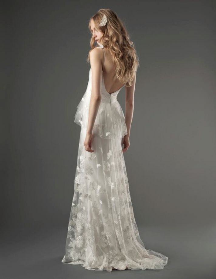 Romantic low back wedding dress with unique lace