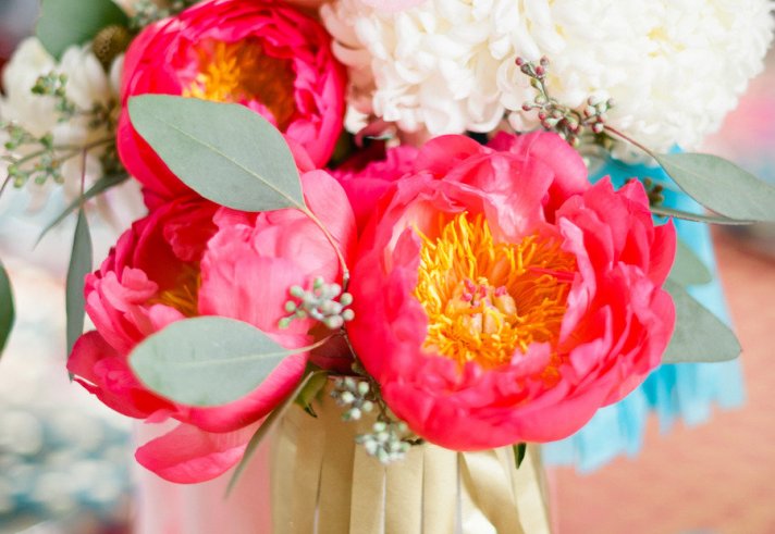Bright pink peony centerpiece with turuoise touches