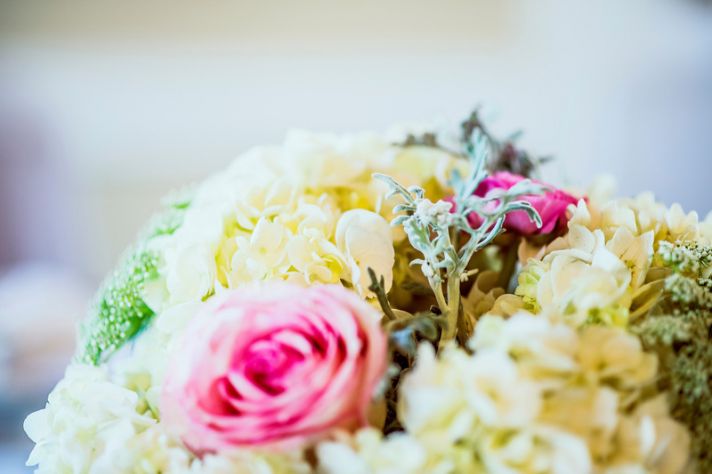 Pale yellow and bright pink wedding flowers