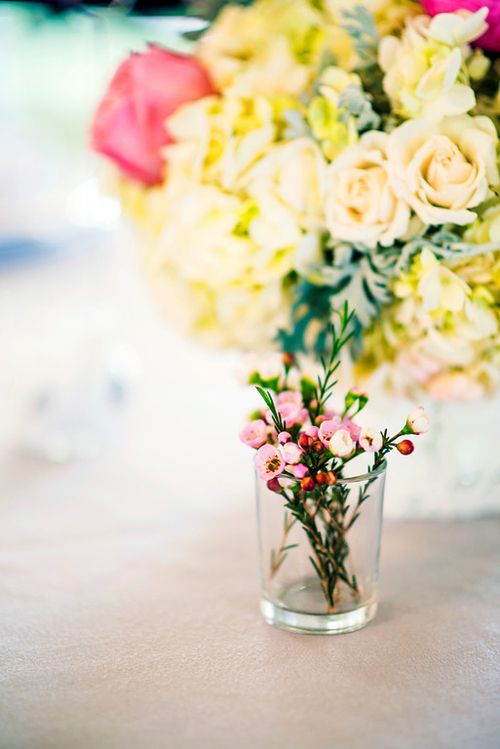 Pale yellow and bright pink wedding flowers