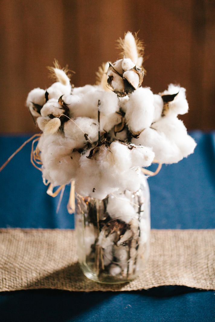 Fresh cotton mason jar wedding centerpiece