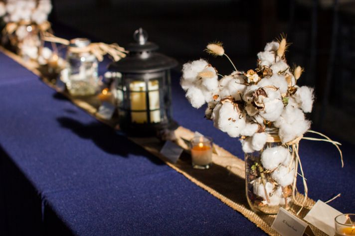 Fresh cotton mason jar wedding centerpiece