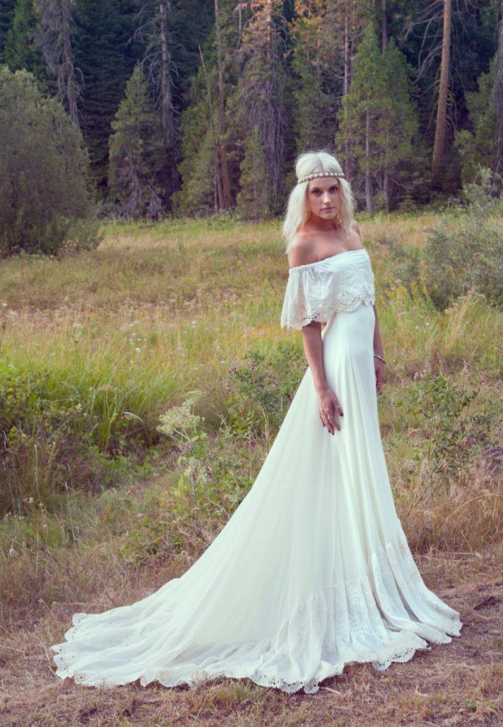 cream bohemian wedding gown with crochet trimmed neckline