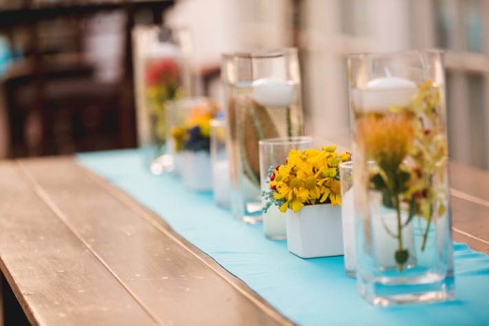 Floating Flowers and Yellow Flower Arrangements as Centerpieces
