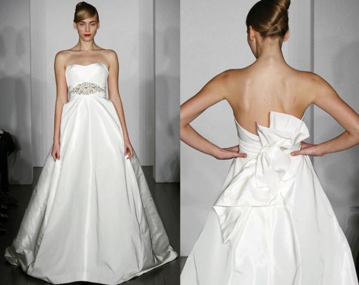 Beautiful white strapless ballgown wedding dress with crystal beading at the waist