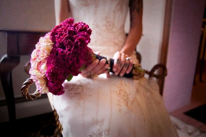 rockin-edgy-featured-wedding-tattoos-ivory-beaded-wedding-dress-fuchsia-bridal-bouquet