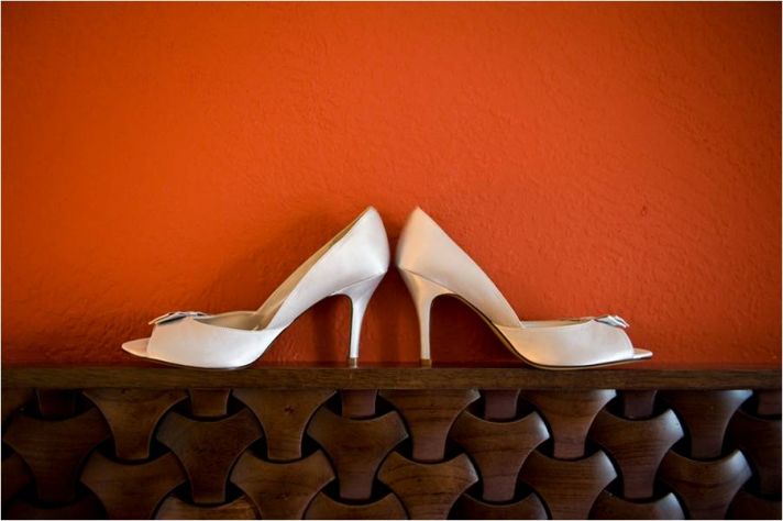 Ivory satin peep toe bridal heels with feminine bow details