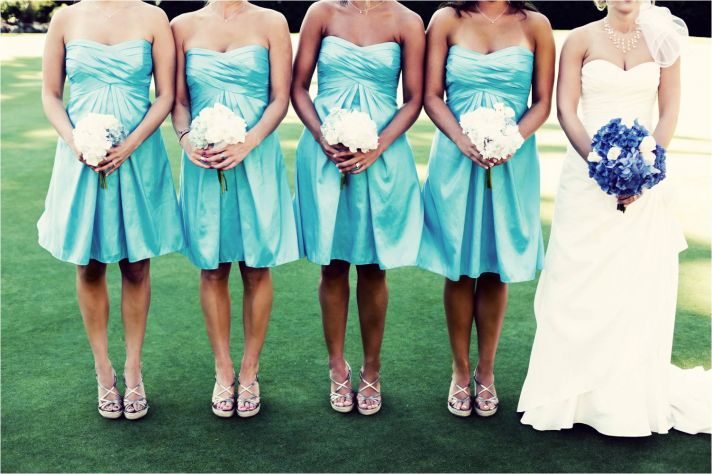 Aqua strapless bridesmaids dresses and white bridesmaid bouquets