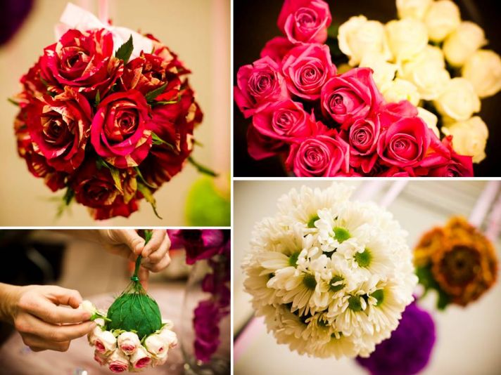 Red, pink and ivory roses and colorful Gerbera daisies arranged in floral pomander balls