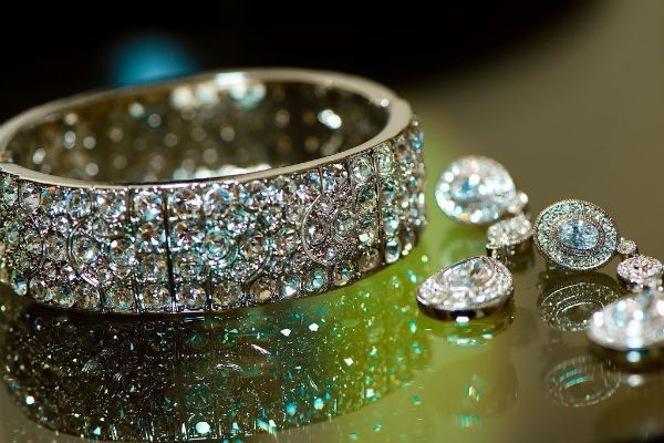 Dazzling bridal cuff bracelet and drop wedding earrings