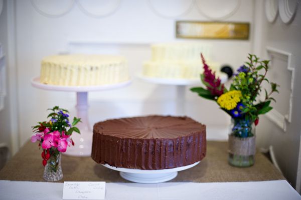 Casual wedding reception dessert table and wedding cake