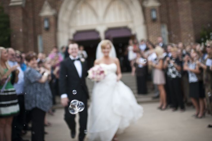 artistic wedding photography ceremony exit with bubbles